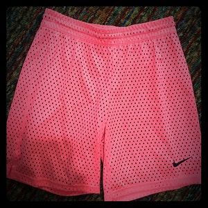 Orange Nike shorts